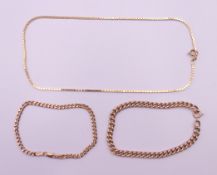 A 9 ct gold necklace and two 9 ct gold bracelets. The former 36 cm long. 14.8 grammes.