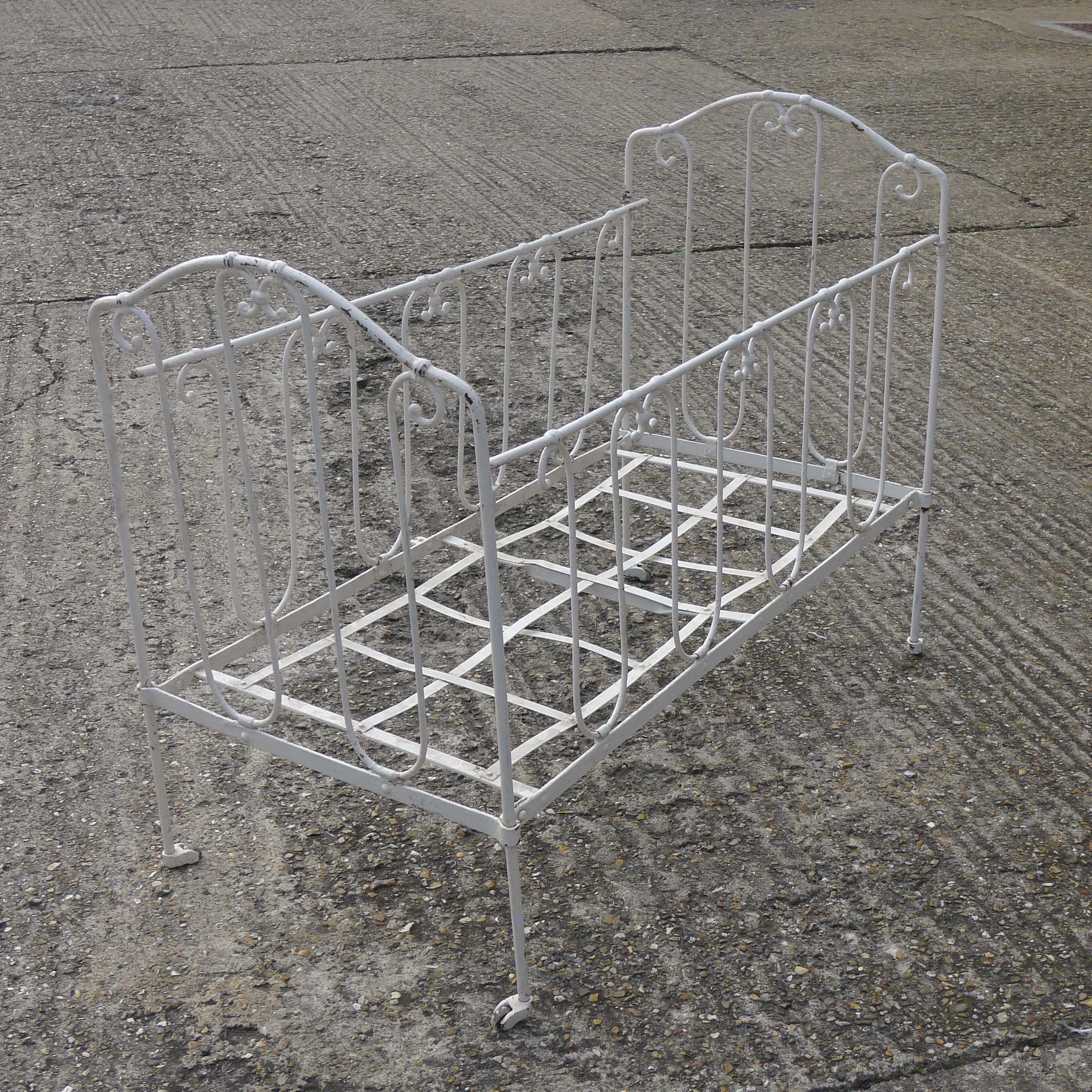 A Victorian iron folding cot. 105 cm long. - Image 2 of 2