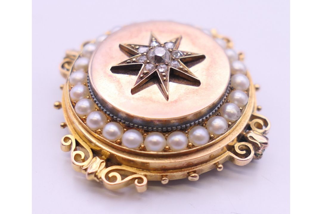 A Victorian unmarked gold seed pearl and diamond set pendant/brooch. 3.5 cm diameter. 13. - Image 5 of 6