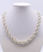 A Contemporary silver necklace. 44 cm long. 77.8 grammes.