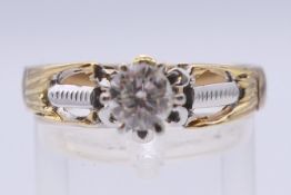 An unmarked 14 ct gold 0.5 carat diamond solitaire ring. Ring size R/S. 5.2 grammes total weight.
