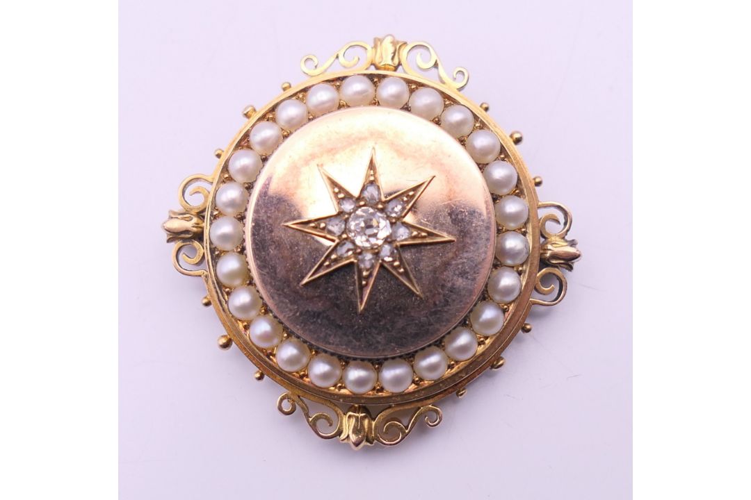A Victorian unmarked gold seed pearl and diamond set pendant/brooch. 3.5 cm diameter. 13. - Image 4 of 6