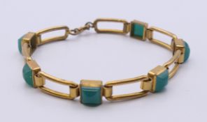 A gilt bracelet. 19 cm long.