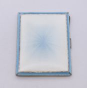 An enamel decorated silver cigarette case, hallmarked for Birmingham 1937. 8 cm x 7 cm.