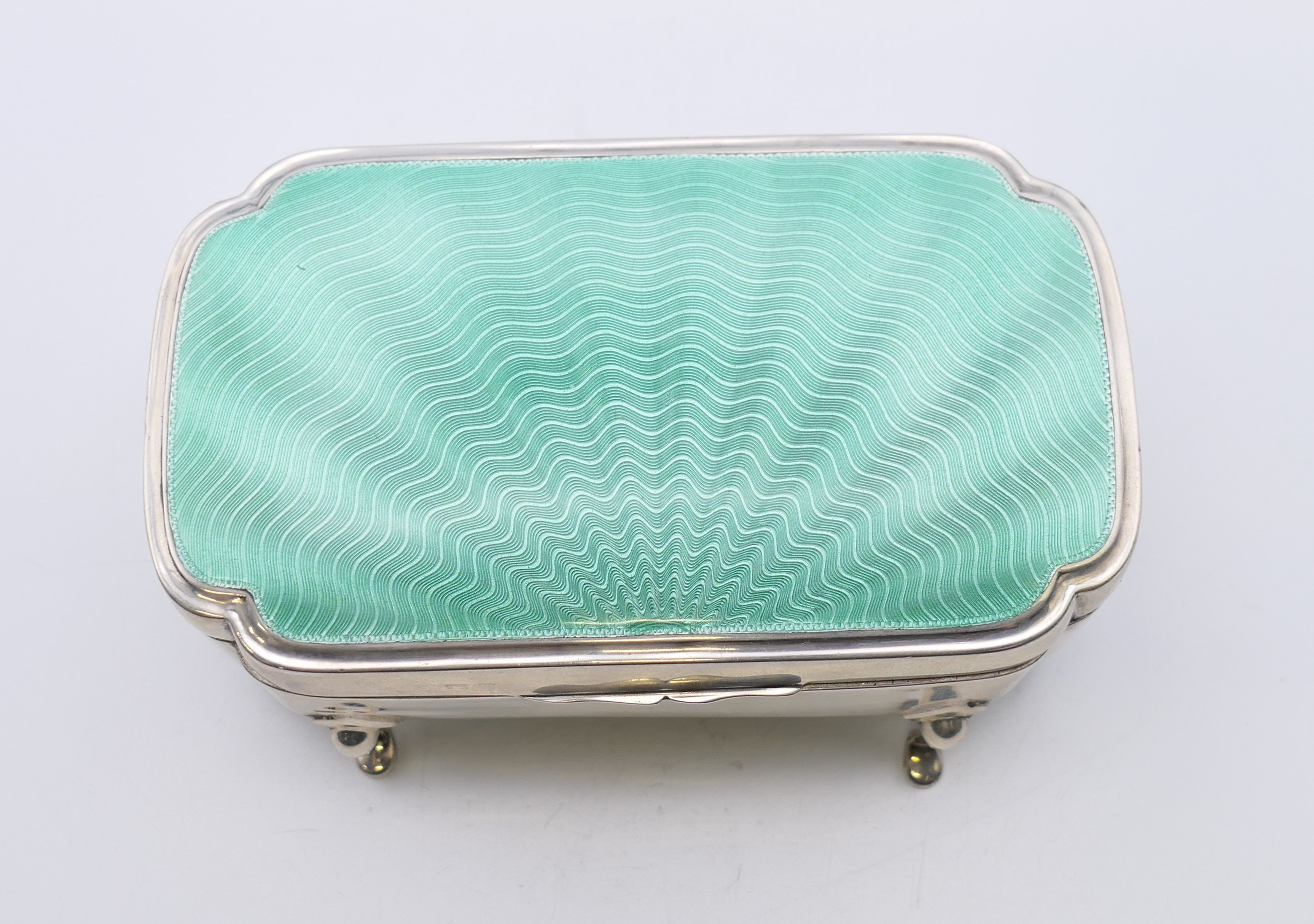 A silver and enamel trinket box, hallmarked for Birmingham 1931, maker's mark of E S Barnsley. - Image 2 of 8