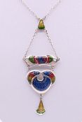 A silver Art Nouveau style pendant chain. Pendant 8 cm high.