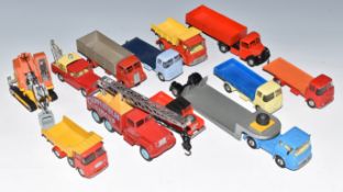 Twelve Corgi Toys and Dinky Supertoys diecast model commercial vehicles including Chipperfield's