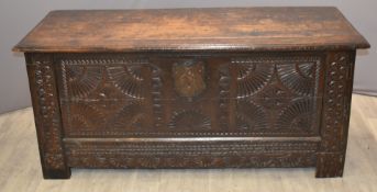 18thC large carved oak coffer with shell decoration and shield shaped lock plates, raised on