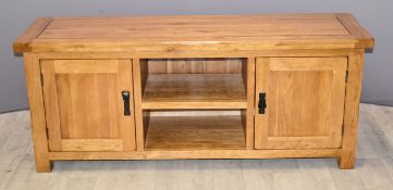 Contemporary solid oak low cupboard and shelf media unit / television stand W139 x D42 x H60cm