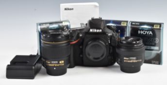 Nikon D810 digital SLR camera outfit with N28mm 1:1.8G and 50m 1:1.4G lenses, HB-64 and HB-47 hoods,