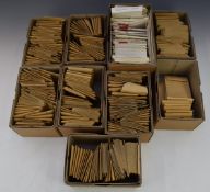 Eight small boxes of used GB stamps in small brown envelopes, and a box of GB mint decimal stamps in
