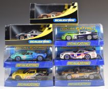 Seven Scalextric model slot racing cars comprising C2465, C2480, C3018, C3081, C2097, C3136 and