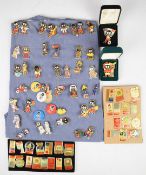 Collection of vintage advertising badges including Robertsons Jam Golly, Golden Shred, Coca Cola,