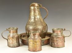 Collection of African tribal copperware including large dishes, covered jug etc, tallest 38cm