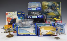 A collection of Corgi and similar diecast aircraft, most in original boxes or display cases.