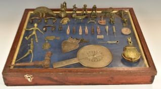 Glazed baize lined display cabinet with African tribal bronze Ashanti / Benin figures, bronze money,