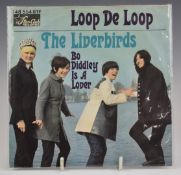 The Liverbirds - Loop De Loop (148 554 SFT). Record appears Ex with picture cover and newspaper