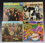 A collection of 12 albums including The Beatles, The Moody Blues, samplers and soundtracks