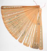 Chinese bamboo and silk fan with flora and fauna decoration, length 24cm