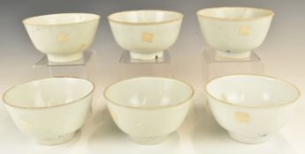 Six Chinese Kangxi period pedestal bowls with ivory / celadon glaze, from the Vung Tau Cargo, some