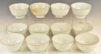 Twelve Chinese Kangxi period pedestal bowls with ivory / celadon glaze, from the Vung Tau Cargo,