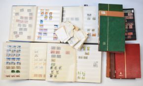 A mint and used GB stamp collection in thirteen stock albums and in glassine envelopes, from