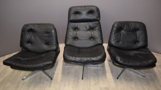 Three retro or mid century designer swivel chairs with chrome bases