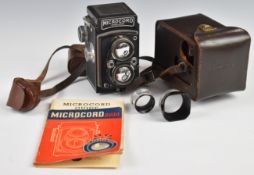 MPP Microcord TLR camera with 77.5mm f3.5 lens, in leather case with guide book