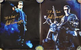 Two Arnold Swarzenegger autographed movie or film photographs, both also with catchphrase 