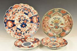 Two Japanese Imari chargers and two plates, largest diameter 36cm