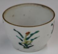 Chinese 19thC cup with enamelled floral decoration, character mark to base, height 5 x diameter 7.
