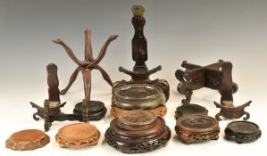 Collection of 19th / 20thC mainly Chinese carved hardwood stands including a large example for a