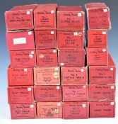Twenty-four Hornby 0 gauge model railway wagons, vans, coaches and trucks including Cement Wagon,