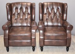 Pair of Chesterfield wing back armchairs with reclining backs