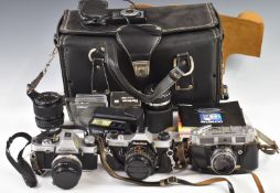 Three 35mm cameras comprising Olympus OM20 SLR with 50mm 1:1.8 and 35-70 1:4 lenses, Mamiya