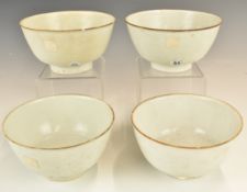 Four Chinese Kangxi period pedestal bowls with ivory / celadon glaze, from the Vung Tau Cargo,