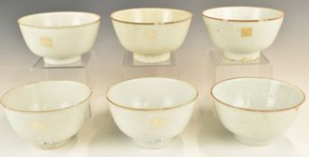 Six Chinese Kangxi period pedestal bowls with ivory / celadon glaze, from the Vung Tau Cargo, some