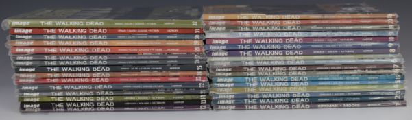 The Walking Dead graphic novel volumes 1-32 by Image Comics together with a signed print by artist