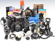 Olympus OM-2 spot/program 35mm SLR camera with 50mm 1:3.5 and 135mm 1:3.5 lenses, Tamron 70-210 1: