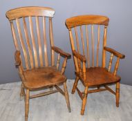 Two Windsor high backed elm seated armchairs