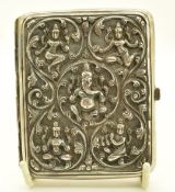 Indian silver cigarette case with embossed decoration of deities, length 8cm, weight 110g
