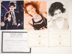 Three autographed film or movie photographs comprising Robert Downey Jr, Uma Thurman and Natalie