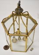 Heavy brass octagonal glazed electric light, diameter 45 x height 70cm