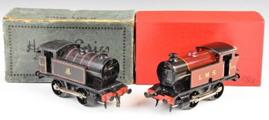 Two Hornby 0 gauge clockwork 0-4-0 tank locomotives LMS 2270 and BR 82011, both in Hornby boxes.