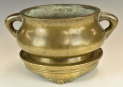 19thC Chinese bronze twin handled pedestal censer, with seal mark to base, on a stand with scrolling