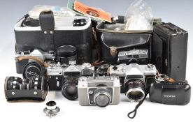 Collectable cameras to include Zenit EM 1980 Olympic SLR, Voigtlander folding camera, Rollei B35 and