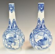 Pair of Chinese 19thC blue and white pedestal vases with dragon decoration, height 24cm