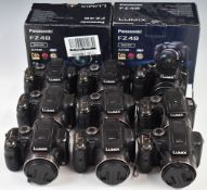 Eight Lumix FZ48 digital cameras together with eight chargers and two boxes