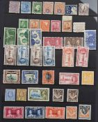A mostly mint GB Commonwealth stamp collection in a folder from Queen Victorian to Queen Elizabeth