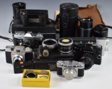 Collectable cameras to include FECA plate camera, Canon Pellix SLR with 50mm 1:1.8 and 135mm 1:3.5